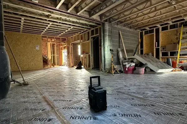 Internal view of extension with insulation and first fix services complete