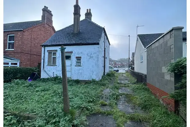Rear view of Eastfield Road house prior to full refurbishment and extension