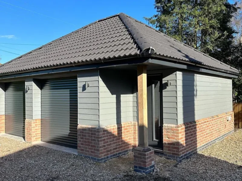 modern garden room conversion with pitched roof and exterior finish