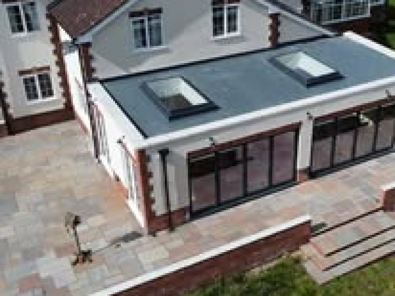 sb constuction before and after large rear extension